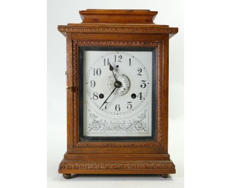 Early 20th century John Bull Automatic Alarm Mantle clock: In oak case, h35 x w23cm.