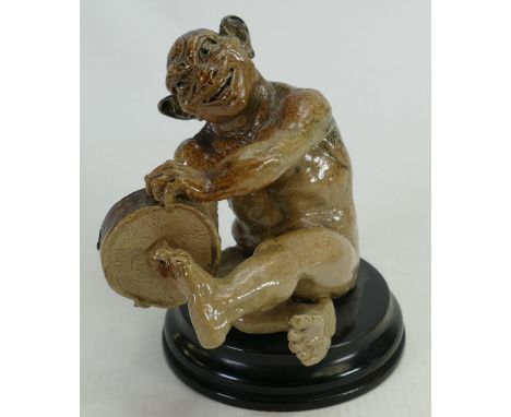 Martin Brothers musician Stoneware smiling Imp figure: Playing the tambourine, signed and dated 1891, height 12cm, on circula