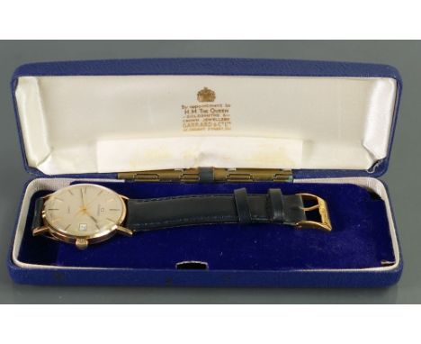 Garrard 9ct gold quartz gents wristwatch: With leather strap and original box.