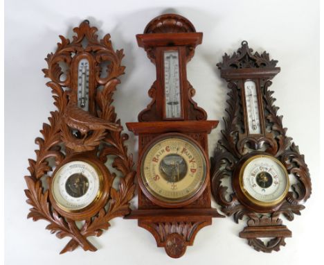 A collection of vintage Barometers: Including carved Black Forest, gilt, wooden examples etc. (8)
