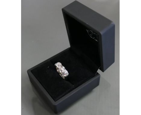 Platinum set 9 stone diamond wedding ring: Weight 11.8g, diamonds each measuring about 2.5mm.  Estimated carat weight of diam