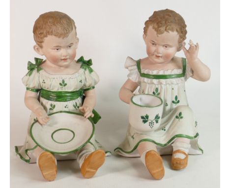 Continental Piano Baby figures: With babies playing with cup and saucers, height.