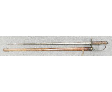 British 1854 Pattern Coldstream Guards Officers Sword: In leather scabbard, the blade marked E Smith Boyle Street, London. le