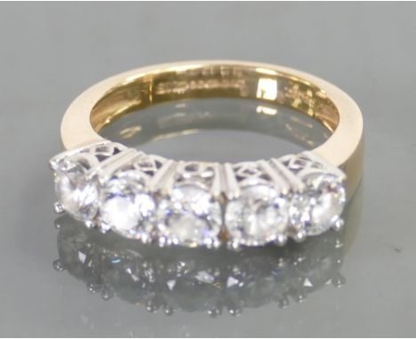 14ct ring set with 5 CZ stones: Size M/N, 5 grams.