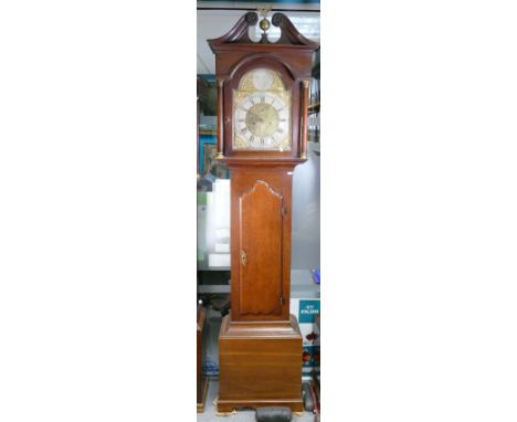 8 day Longcase clock by John Rhodes of London circa 1755-1762: It has a brass dial with silvered chapter ring.  Solid oak cas