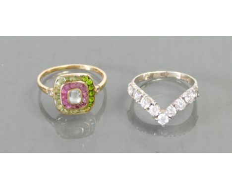 18ct peridot / ruby / white sapphire / and white stone ring: 2.6 grams together with 9ct white stone ring 2.3 grams. (2)