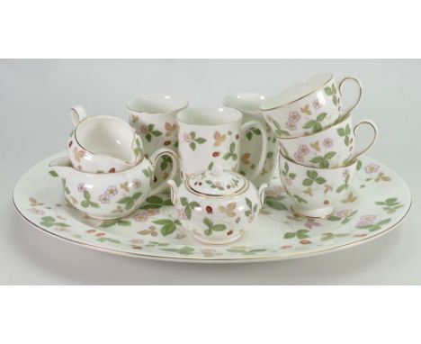 Wedgwood tea set in the Wild Strawberry design: Including cups, saucers, mugs, large oval platter, teapot, sugar and milk jug