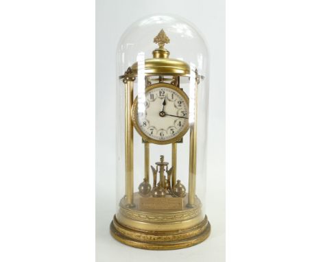An early 20th century 365 day brass Mantle clock with circular Arabic dial in a glass dome, height 36cm