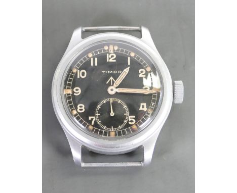 Timor WWII military wristwatch: Stainless steel case with the back plate marked with broad arrow and K5302 35202.