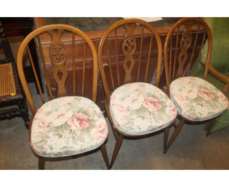 THREE ERCOL DINING ROOM CHAIRS