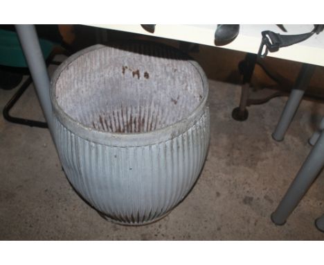 A VINTAGE METAL PLANTER