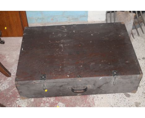 A LARGE WOODEN TRUNK