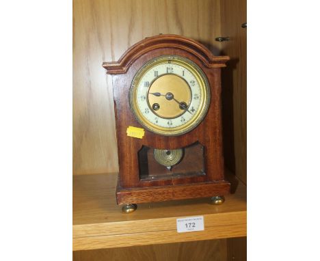 A WIND UP MANTEL CLOCK NO KEY 