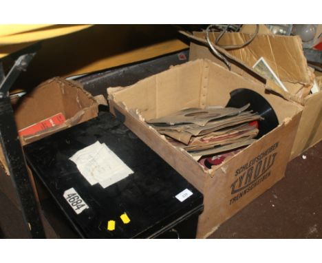 A SMALL TIN TRUNK TOGETHER WITH A SELECTION OF GRAMAPHONE RECORDS ETC