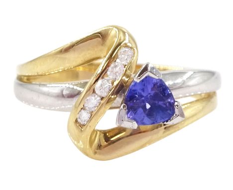 14ct white and yellow gold trillion cut tanzanite and round brilliant cut diamond crossover ring, stampedCondition Report:App