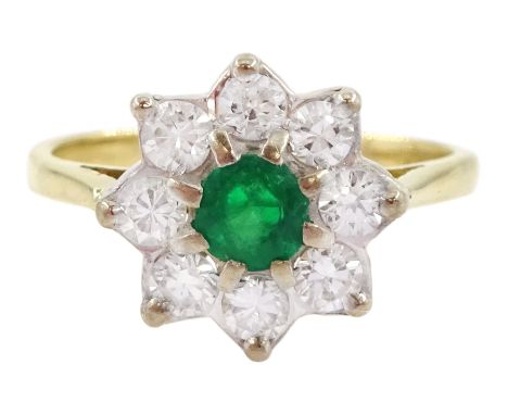 Gold emerald and round brilliant cut diamond cluster ring, stamped 18ct, total diamond weight approx 0.50 caratCondition Repo