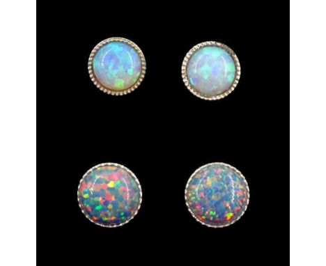 Two pairs of silver opal stud earringsCondition Report:Diameters = 6mm and 7mm, good condition