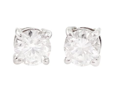 Pair of 18ct white and yellow gold round brilliant cut diamond, screw back stud earrings, total diamond weight approx 0.85 ca
