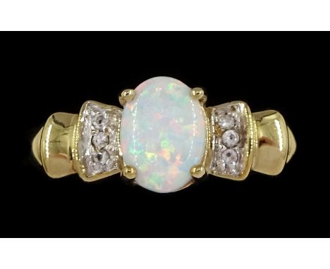 9ct gold opal and cubic zirconia ringCondition Report:Approx 2.4gm, size P