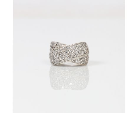 MODERN DIAMOND CROSSOVER RING. A wide crossover ring set with round brilliant cut  pavé diamonds. TDW approx. 1.86ct. Widest 