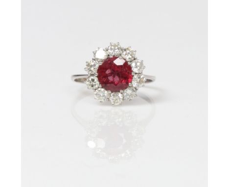 CERTIFICATED RUBY AND DIAMOND CLUSTER RING. Complete with IDRC (Independent Diamond Report Centre) dated 23/11/2021. The repo