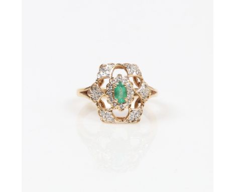DIAMOND AND EMERALD CLUSTER RING. One emerald oval mixed cut stone, measuring approx. 5 x 3mm. Surrounded with two open work 