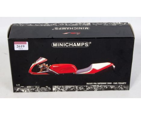 A Minichamps 1/12 scale model of a Carl Fogarty Ducati 996 2000 Superbike, finished in red, model No. 001201, appears as issu