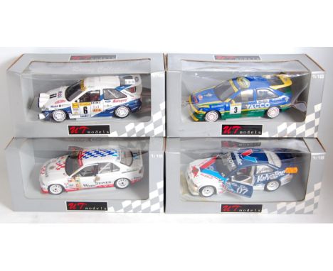 A UT Models 1/18 scale Racing Collection boxed diecast group all WRC examples, to include a BMW M3, a Yacco Ford Escort RS Co