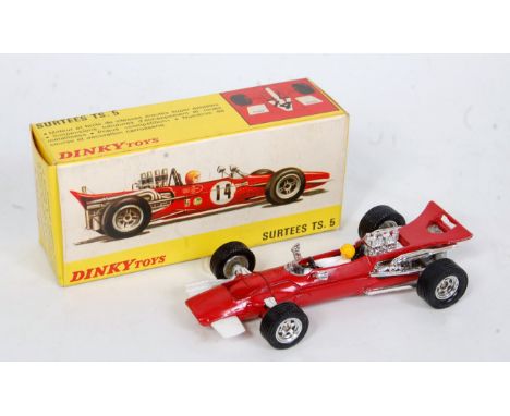 A French Dinky Toys No. 1433 Team Surtees TS5 racing car, comprising of red body with chrome hubs and racing No. 14 and drive