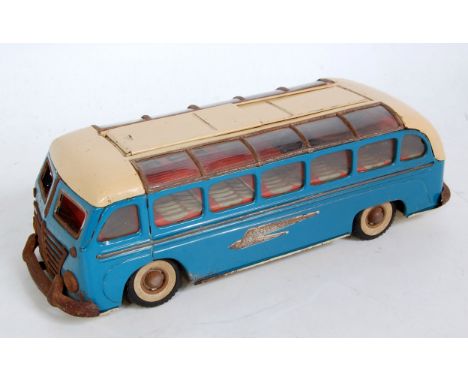 An SG Gunthermann tinplate and clockwork model of a continental holiday touring coach, comprising blue and cream body with de