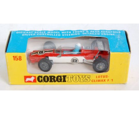 A Corgi Toys No. 158 Lotus Climax F1 racing car comprising of orange and white body with racing No. 8, housed in the original