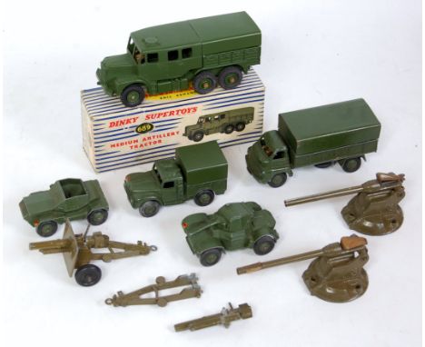 A collection of various boxed and loose Dinky Toy and Britains military diecasts to include No. 689 medium artillery tractor 