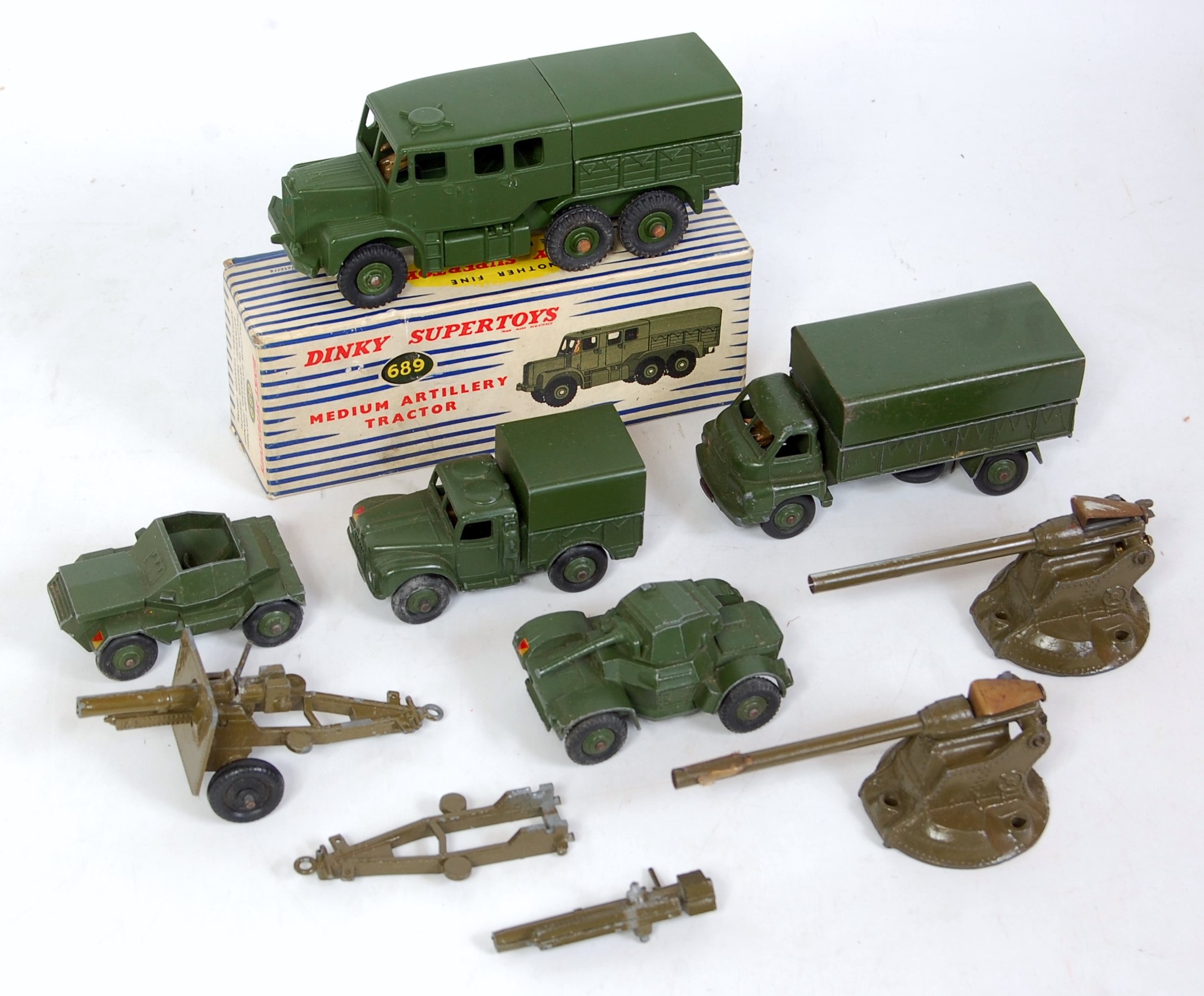 A collection of various boxed and loose Dinky Toy and Britains military ...