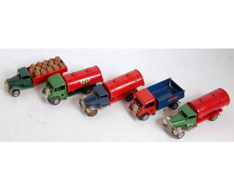 Five various loose tinplate and clockwork Triang Minic commercial vehicles, to include a BP tanker, a Minic transport tipping
