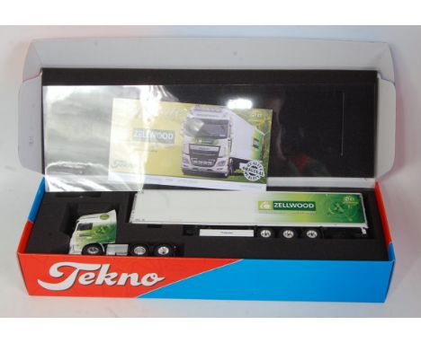 A Tekno 1/50 scale Zellwood model of a Daf XF tractor unit with refrigerator trailer, limited edition example with certificat