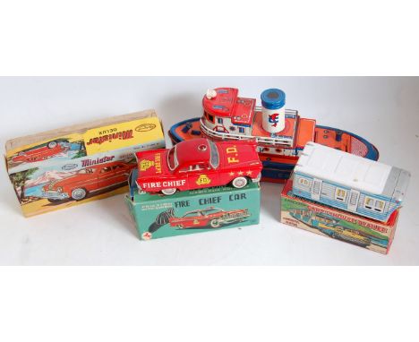 A collection of boxed and loose land and sea vehicles to include a Japanese tinplate and friction drive car with house traile