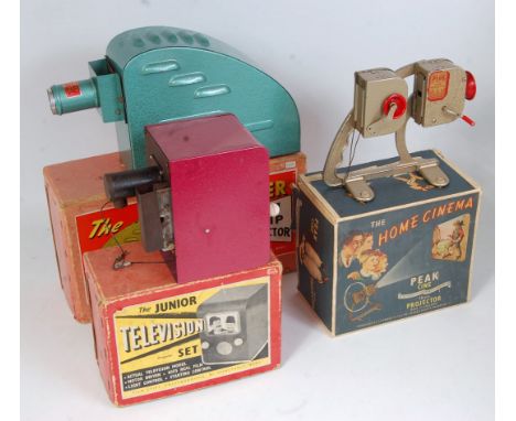 Three various boxed childrens home cinema projectors to include a JS Frieze &amp; Co Home Cinema 16mm projector