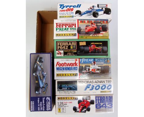 A Modelers &amp; Ebbro 1/20 and 1/24 scale F1 plastic kit group to include a Ferrari 643, a Footwork Mugen Honda FA13, a Ferr