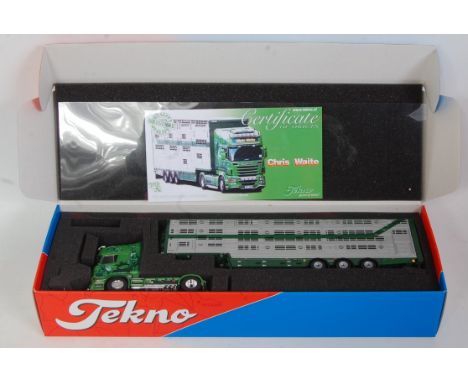 A Tekno 1/50 scale boxed model of a Chris Waite Scania R730 tractor unit and livestock trailer from the England Livestock Col