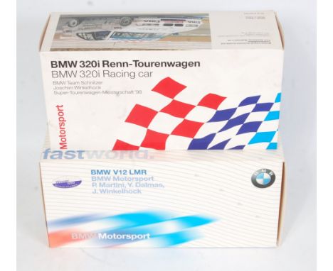 A UT Models 1/18 scale boxed BMW race car group, two boxed examples to include a BMW 320i racing car, together with a BMW V12