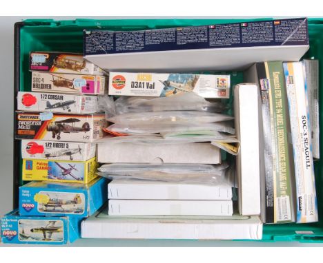 One tray containing 25+ various mixed scale plastic and vac form aircraft kits to include a Matchbox Curtis SBC-4, an Airfix 