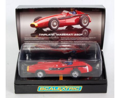 A Scalextric limited edition No. C2929A Maserati 250F tinplate car, appears as issued in the original sleeved lift-up lid all