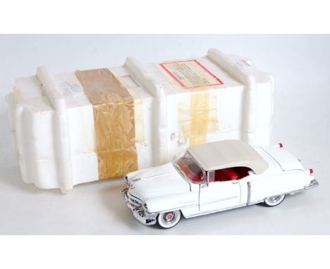 A Franklin Mint 1/24 scale boxed and polystyrene packed diecast group to include a 1933 Pierce Silver Arrow, a 1953 Cadillac 