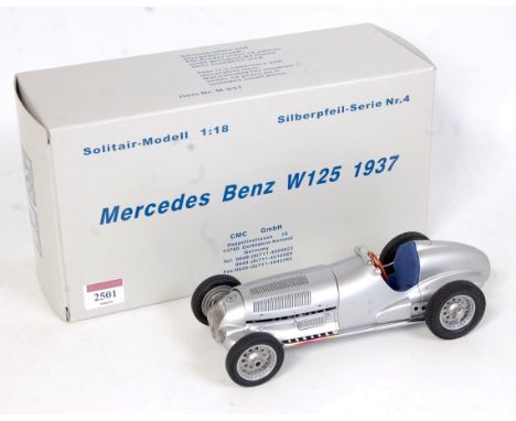 A CMC Exclusive Models 1/18 scale No. M-031 Mercedes Benz W125 1937 racing car finished in silver with blue interior and brow