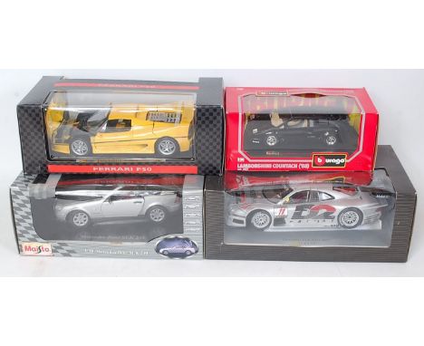 Nine various boxed 1/18 and 1/24 scale classic car and high speed racing diecasts to include Bburago, Maisto, and others, exa