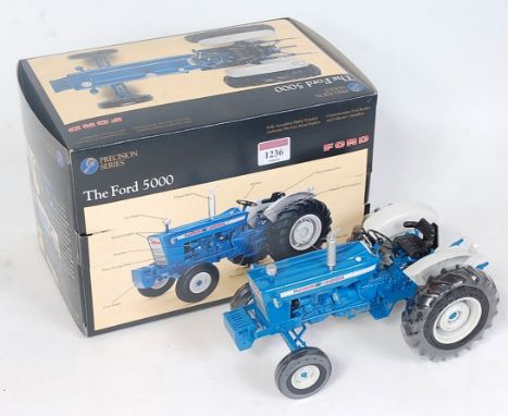 An ERTL Precision Series 1/16 scale model of a Ford 5000 tractor, model No.13503 in the original polystyrene packed box with 