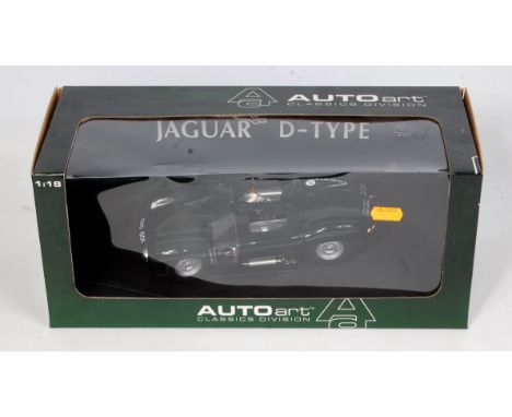 An Auto Art Classics Divisions Model No. 73561 Jaguar D-type racing car comprising of dark green body with racing No. 92 and 