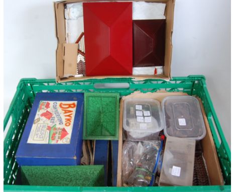 A large collection of mixed Bayko to include various sections, roof sections, connecting rods, brickwork etc, some housed in 