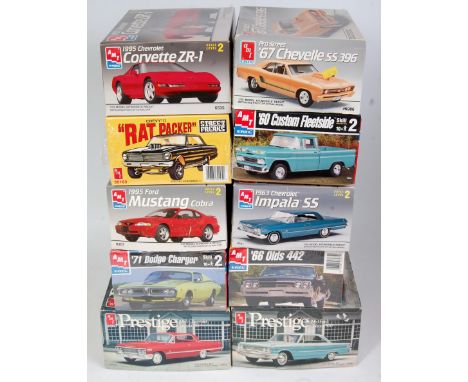 An AMT/ERTL 1/25 scale mixed car kit group, all appear as issued, to include a Street Freaks Chevy 2 Rat Packer, a 1971 Dodge