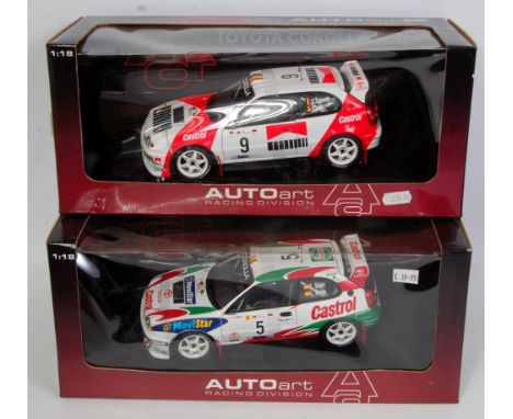 An Auto Art Racing Division 1/18 scale boxed WRC diecast group, two examples to include a Movie Star Castrol Toyota Corolla W